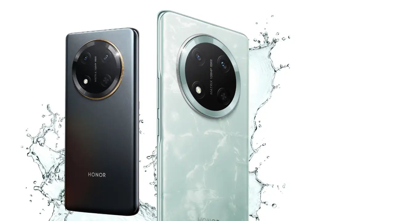 काले और हल्के हरे रंग में Honor X9C 5G स्मार्टफोन पानी के छींटों के साथ